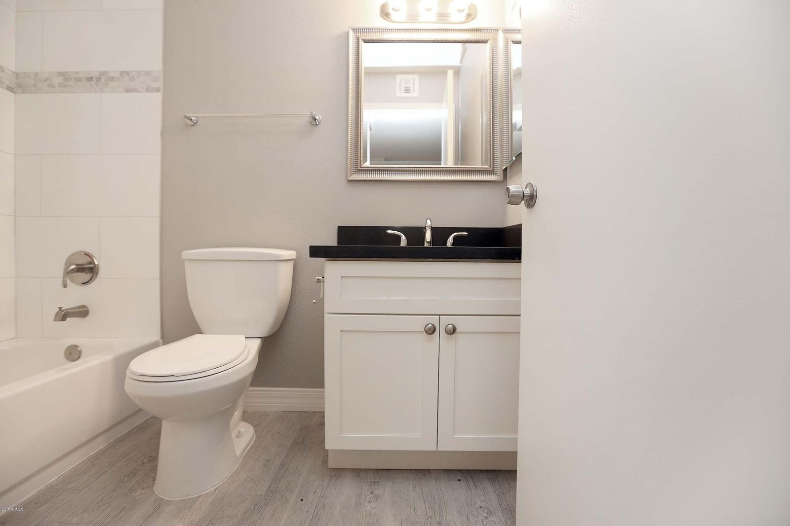 Guest bathroom refresh with new tile floor