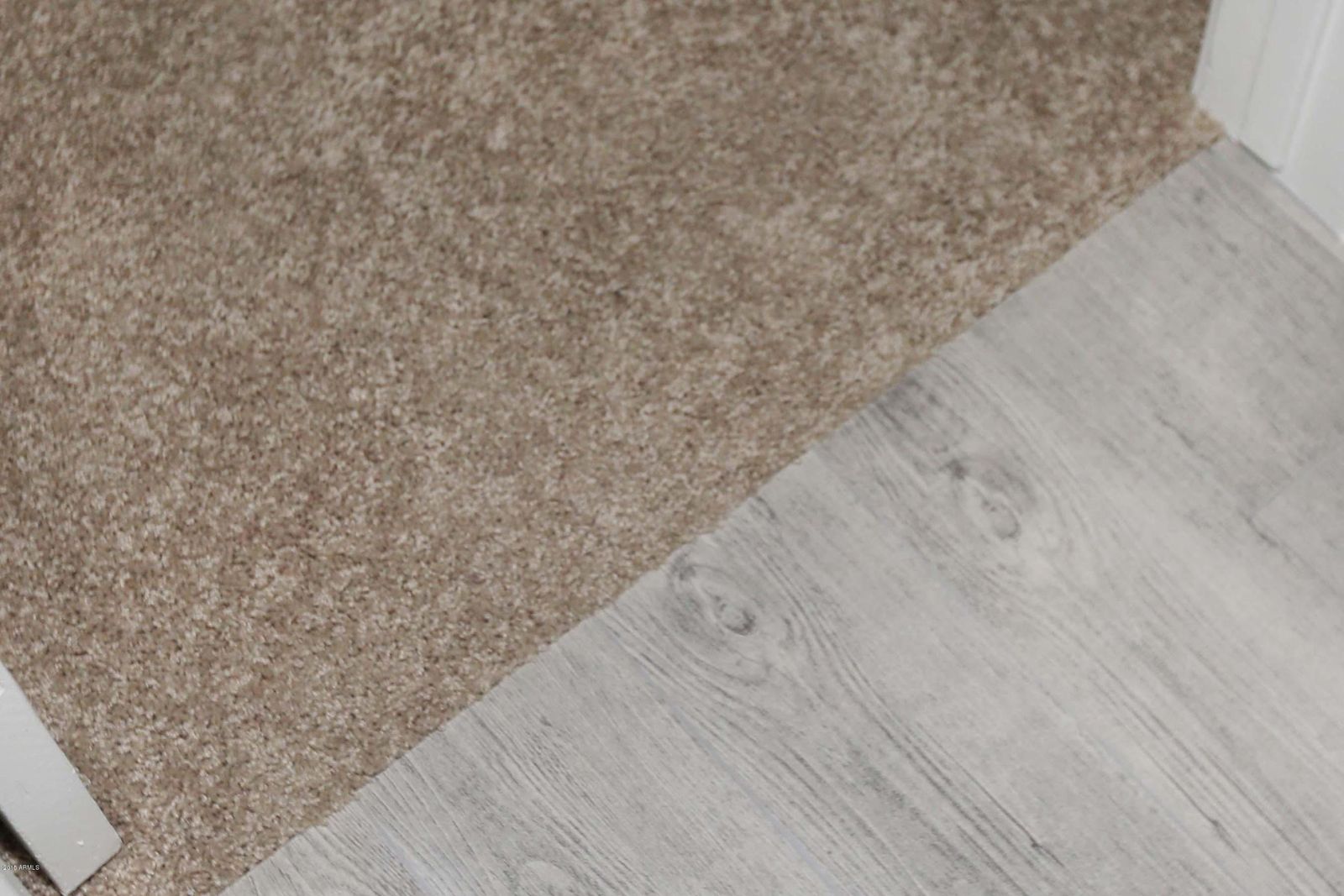 Clean transition from carpet to plank flooring